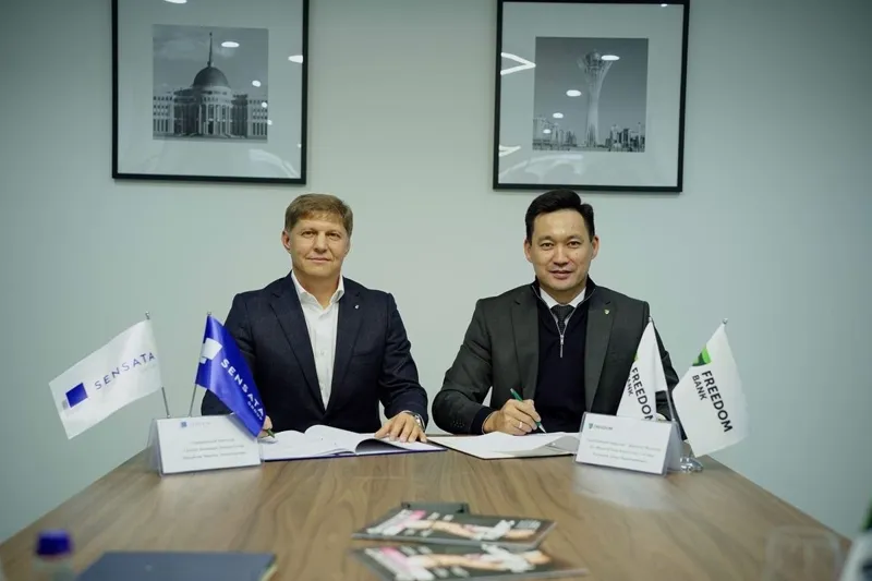 Подписание документов между стройкомпанией и банком